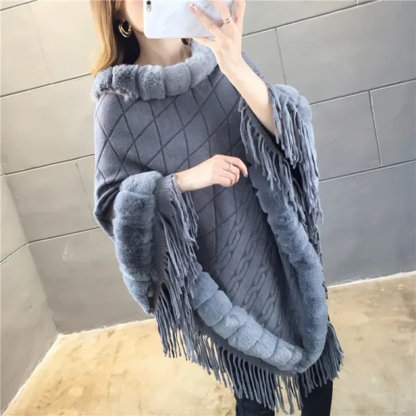 poncho en laine et fourrure d'agneau
